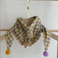 Close-up of cute baby cotton plaid scarf featuring cartoon rabbit plush and cute pom poms. - Purple Yellow Cute Rabbit Plaid Triangle Scarf