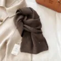 Cozy brown knitted winter scarf for women and men, warm fashion neck wrap accessory. - Coffee