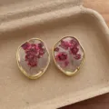 Chic geometric transparent dried flower resin earrings, unique gold rim handmade drop earrings for women. - Irregular Oval Floral