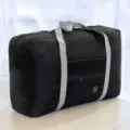 Large capacity travel storage bag portable black luggage duffel bag with front zipper pocket - Black