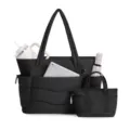 Black puffer tote bag set detail featuring multiple pockets, organized compartments, and durable. - Black