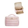 Pink puffer cosmetic bag with large capacity, wide opening and portable handle design. - Lotus Pink