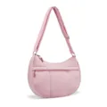 Detail of the pink nylon quilted crescent shoulder bag featuring adjustable strap. - Pink