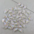 Acrylic bird loose beads detail shot, showing gold painted lines and iridescent finish. - Quicksand Style