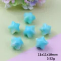 Detail view of double color gradient acrylic star beads, showing the 11x11x10mm size and texture. - Lake Blue
