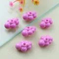 Close-up of pink acrylic cloud beads, smooth surface, perfect for DIY jewelry making details. - 3D Style / Magenta Pink