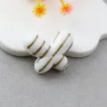 Detail view of large striped fat butterfly loose bead, DIY jewelry and phone chain accessory - White