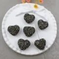 Detailed close-up of dark grey heart acrylic sugar beads showing straight hole design. - Style 8 Black