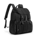 Detailed view of black quilted backpack with dual buckles, padded straps and front zip pocket. - Black