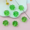 Green acrylic four-leaf clover faceted spacer beads for jewelry accessory detail shot. - 13mm / Transparent Deep Green