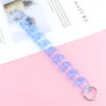 Blue translucent acrylic chain detail shot, perfect for phone case charm or bag strap accessory. - Transparent Blue