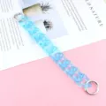 Blue acrylic chain strap for phone or bag, translucent marble loop accessory with metal rings. - Transparent Lake Blue