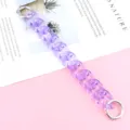Detailed close-up of translucent purple acrylic chain link accessory with metal rings. - Transparent Purple