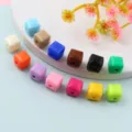 Close up view of colorful faceted acrylic square cube beads, ideal jewelry making accessories. - Style B Random Mixed Colors 8mm