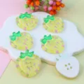 Cute strawberry acrylic 4-hole buttons for DIY jewelry crafts, sewing, and phone case decoration. - Yellow Background Pink Little Flower
