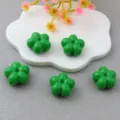 Green acrylic five-petal flower beads close-up, drilled loose bead jewelry DIY accessory. - Green