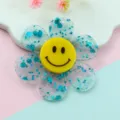 Acrylic glitter flower pendant with yellow smiley face center for DIY jewelry making accessories. - 43mm / Blue