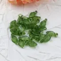Green leaf acrylic loose beads detail close-up, perfect for DIY bracelet necklace making. - Transparent Olive Green Leaf