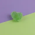 Close-up of green acrylic heart sugar bead with sparkling crystal texture for DIY jewelry. - Green (Style 11)