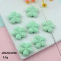 Close-up of glitter mint green flower beads, hole design for jewelry DIY making details. - Flower / 20mm / Green