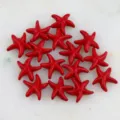 Détail perle étoile de mer rouge gros plan, surface lisse avec trou droit pour bijoux DIY. - Rouge Brillant