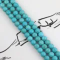 Close-up detail of blue turquoise round beads string, showing natural matrix texture and fine polish. - Round Beads / 8mm / Blue