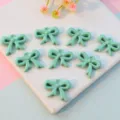 Acrylic ribbon bow pendant charms, light green hollow DIY jewelry making accessories - 16mm / Light Green