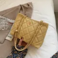 Yellow quilted shoulder bag for women, chic PU leather handbag with gold chain straps. - Yellow