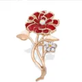 Elegant red enamel carnation brooch pin with gold-tone stem and sparkling rhinestones for women. - Gold