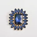 Elegant blue crystal flower brooch with gold-tone setting and sparkling rhinestones for women. - Blue