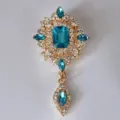 Vintage gold tone blue crystal rhinestone brooch pin elegant apparel accessory for women jewelry. - Sky Blue