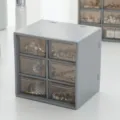 Scatola portaoggetti trasparente a 6 cassetti, organizer per cosmetici e gioielli da scrivania. - Grigio