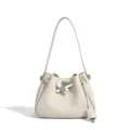 Elegant genuine leather bucket bag with metal lock, minimalist shoulder crossbody design. - Milk White