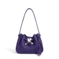 Elegant purple leather shoulder bag for women, stylish bucket design with silver metal hardware. - Blueberry Purple