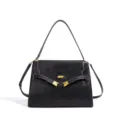 Black leather handbag with gold hardware, classic trapezoid design, elegant shoulder bag. - Black
