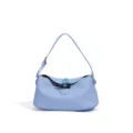 Light blue pebbled leather shoulder bag with chic toggle closure and adjustable strap for women. - Hampton Blue