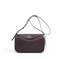 Minimalist leather shoulder bag for women, chic commuting crossbody bag with metal lock. - Ebony