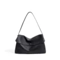 Black leather shoulder bag, stylish casual handbag with single strap and flap closure. - Black