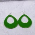 Green teardrop hollow acrylic earrings close-up, simple fashion geometric drop earring details. - Green Teardrop