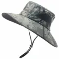 Detailed view of the wide-brim sun hat showing breathable mesh and adjustable chin strap. - Green Camouflage