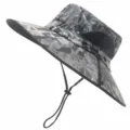 Detailed view of the wide-brim sun bucket hat with mesh ventilation and adjustable chin cord. - Gray Camouflage