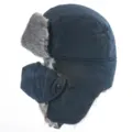 Close-up detail of winter warm trapper hat with soft faux fur earflaps and windproof shell. - One Size / Navy Blue