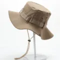 Beigefarbener Outdoor Sonnenschutz Anglerhut Detail, atmungsaktive Ösen und Windkordel. - Einheitsgröße / Camel