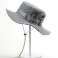 Grey outdoor cotton bucket hat with chin strap and eyelets for sun protection and hiking. - One Size / Light Gray