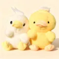 Close-up of cute yellow and white plush duck toys, soft stuffed animal doll for lovely gifts. - Creative Chick / 23cm