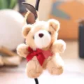 Cute fluffy teddy bear plush pendant detail close up with red bow and heart charm for bags. - Brown / 13cm