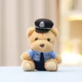 Cute police bear plush toy pendant, soft fluffy material, detailed uniform and police hat design. - Police Brown (Bead Chain)