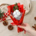 Handheld mini Christmas dried flower bouquet with cotton and red berries for holiday gift decor. - Cotton Red Christmas Bouquet