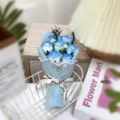 Blue soap rose bouquet detail, exquisite mesh wrapping and decorative ribbon for romantic gifts. - Ice Blue