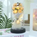 Eternal rose soap flower bouquet in glass dome with LED lights for romantic gift detail. - 7-Flower Pearl Yarn LED Gift Bag Style / Champagne
